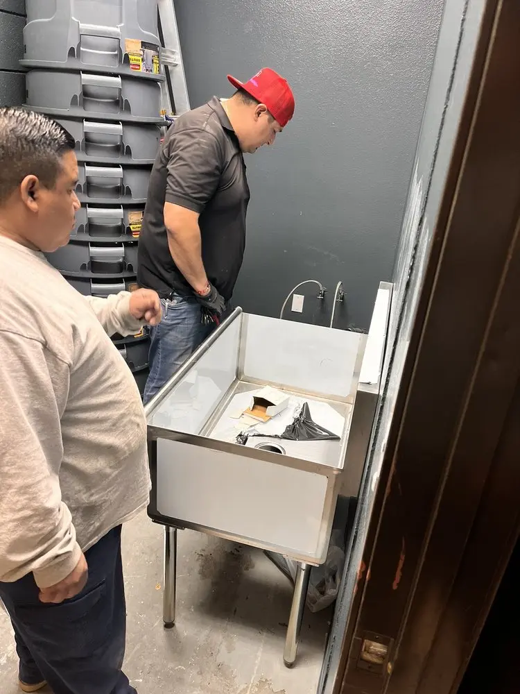 Commercial plumbing and sink installation in Newfield